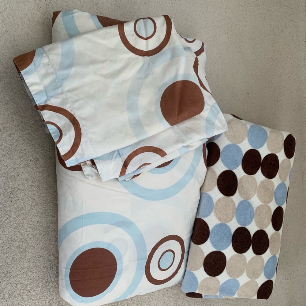 Duvet cover, two shams, coordinating blanket.